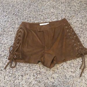 Suede shorts with ties on sides